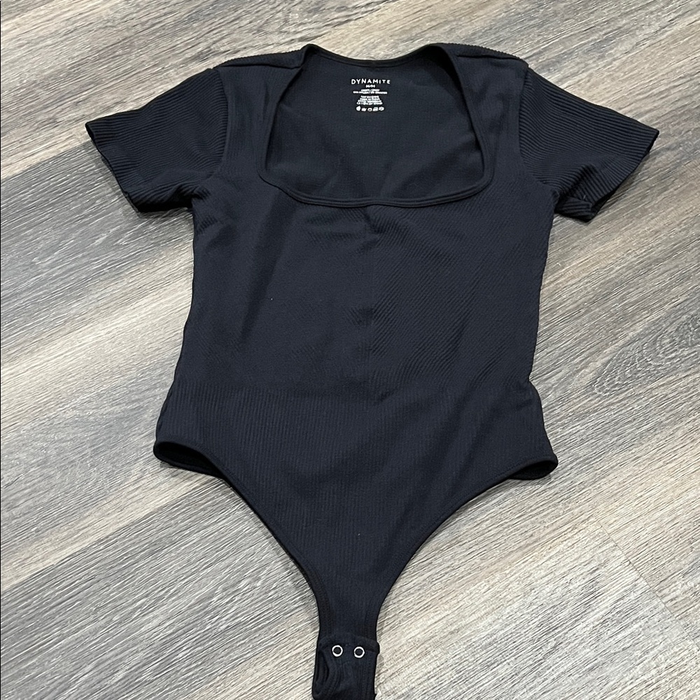 (17) Dynamite Classic Bodysuit